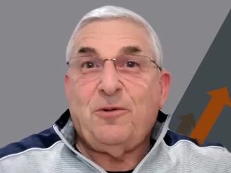 Dave Kurlan at a podium microphone doing a sound check for sales best practices, with speech bubble saying 'check, check, testing 123' – 2026 sales overhaul article header